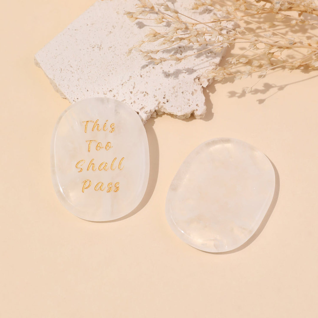 Pocket crystal stone, pale clear oval with engraved “This Too Shall Pass” text