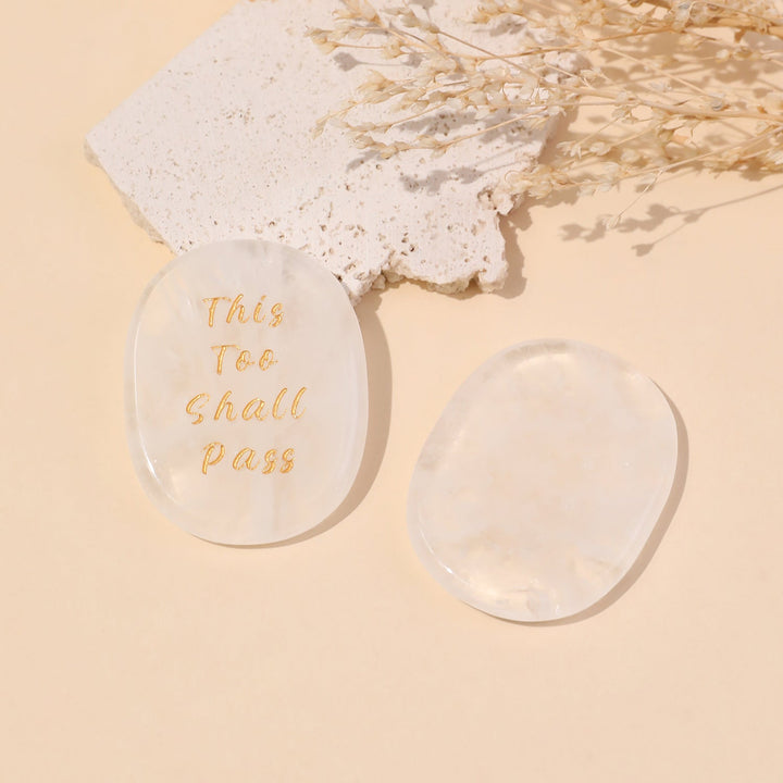 Pocket crystal stone, pale clear oval with engraved “This Too Shall Pass” text