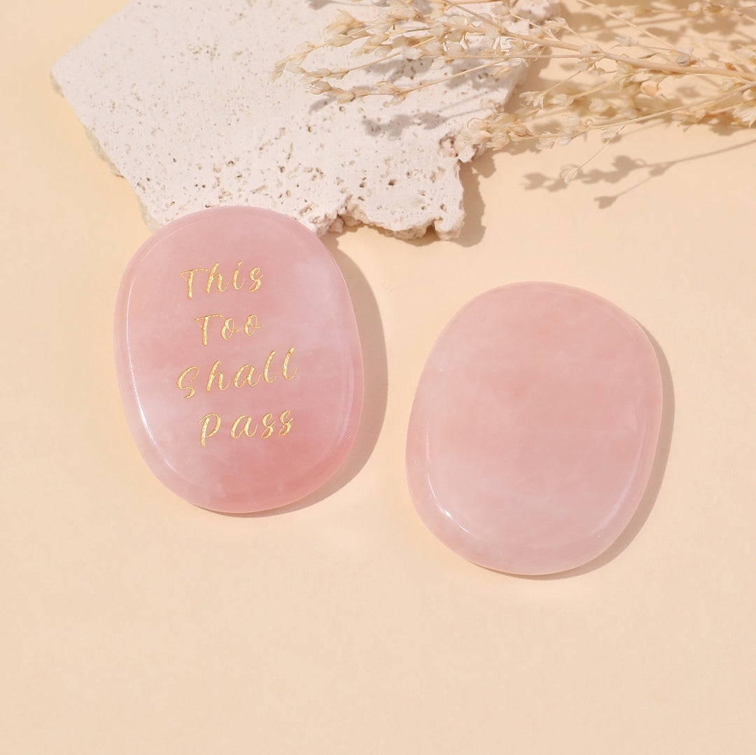 Light pink oval crystal stones with gold “This Too Shall Pass” text