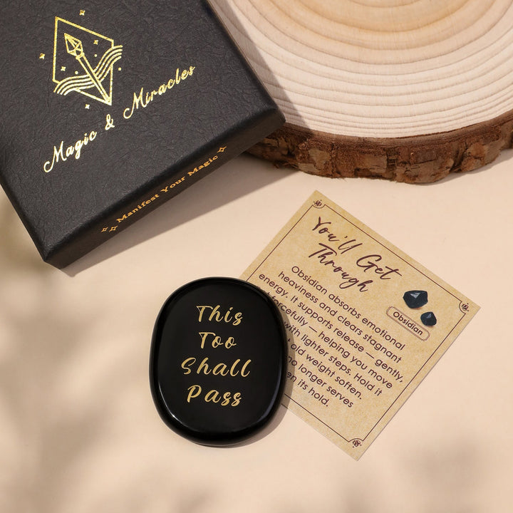 Pocket crystal stone, black oval with engraved “This Too Shall Pass” text
