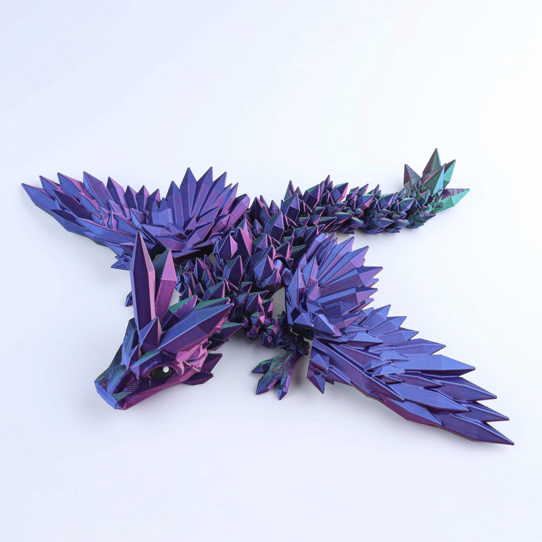 Purple and teal crystal-wing baby dragon fidget toy with spiky faceted wings