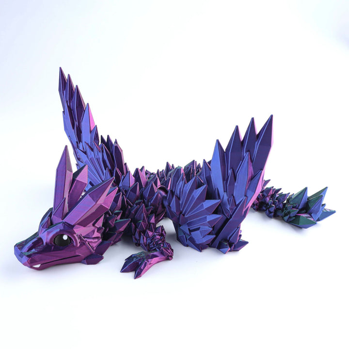 Purple crystal wing baby dragon fidget toy with articulated spiked body and tail pieces