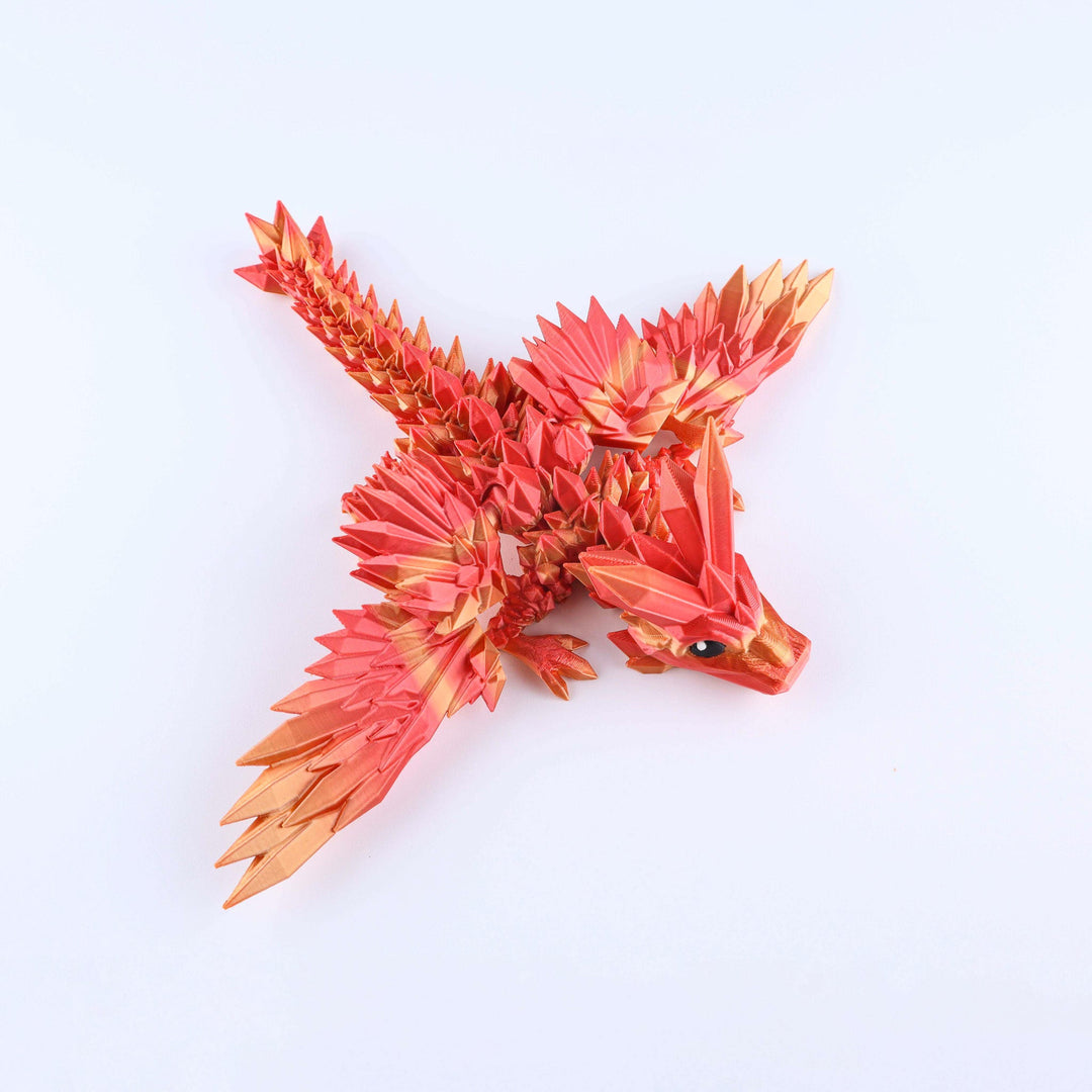 Red orange crystal wing baby dragon fidget toy with articulated spiked wings and tail