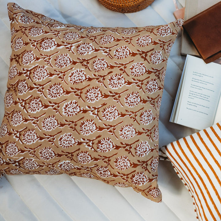 Linen throw pillow cover, chai brown, close-up of white floral medallion print