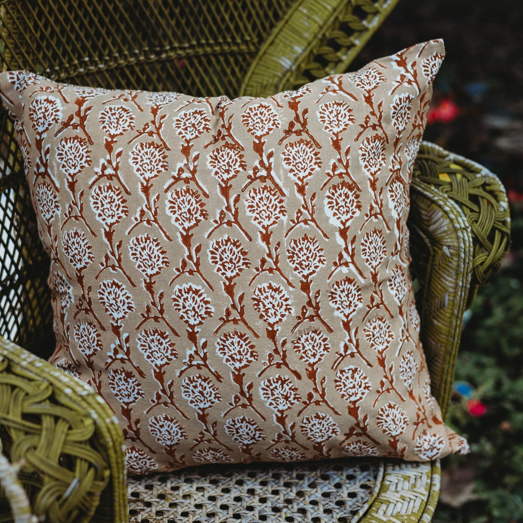 Linen throw pillow cover with chai brown base and white floral medallion pattern