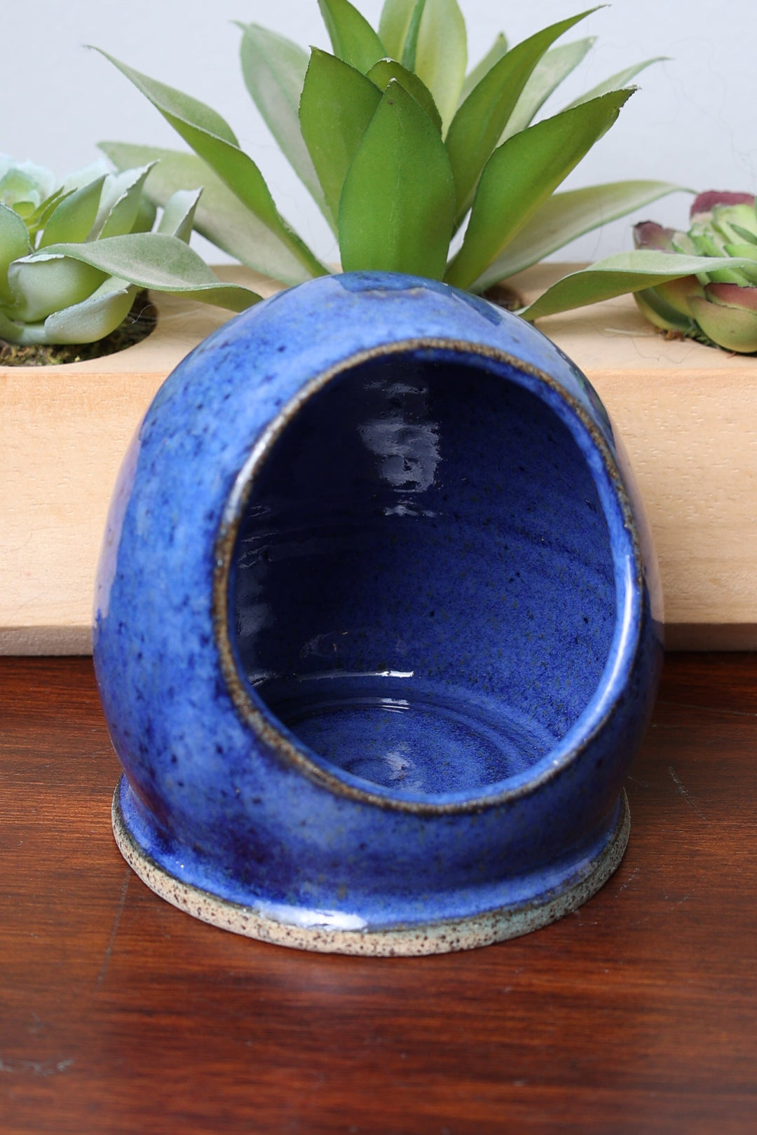 Handmade stoneware salt cellar, deep blue glaze with speckled rim, open bowl