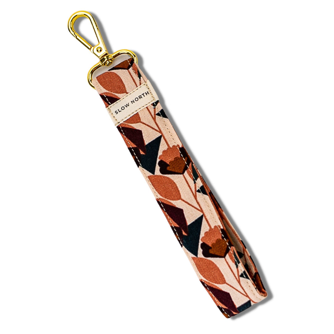 Fabric wristlet keychain with geometric heart pattern, gold keyring and clip