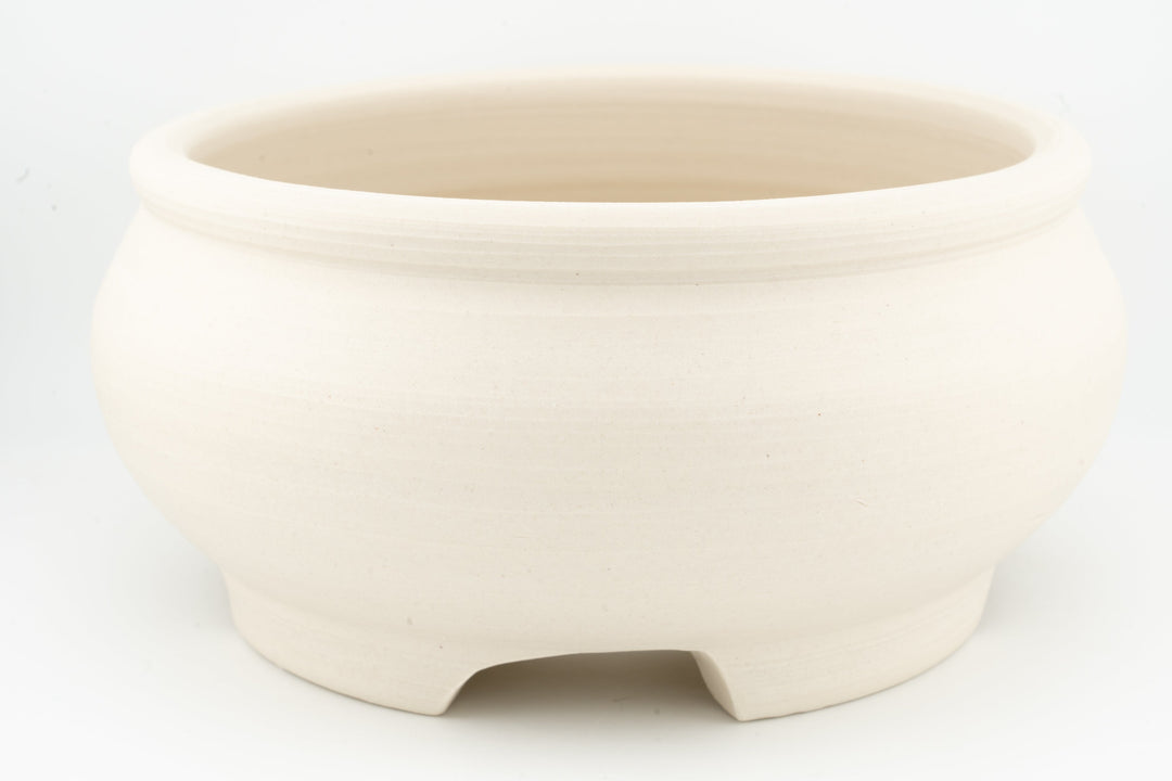 Unglazed white stoneware bonsai pot with three-foot base and round rim