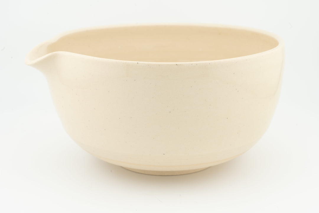 Ceramic bowl with optional spout, matte cream glaze and smooth interior