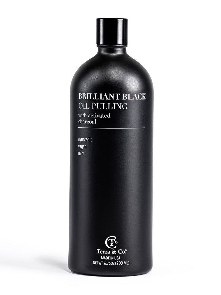 Brilliant Black oil pulling charcoal mouthwash bottle