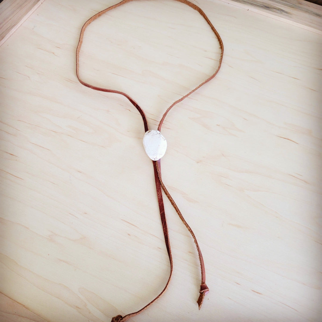 Leather lariat necklace with white oval turquoise slab pendant on brown cord