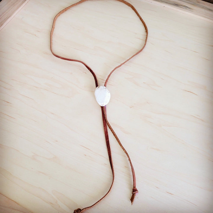 Leather lariat necklace with white oval turquoise slab pendant on brown cord