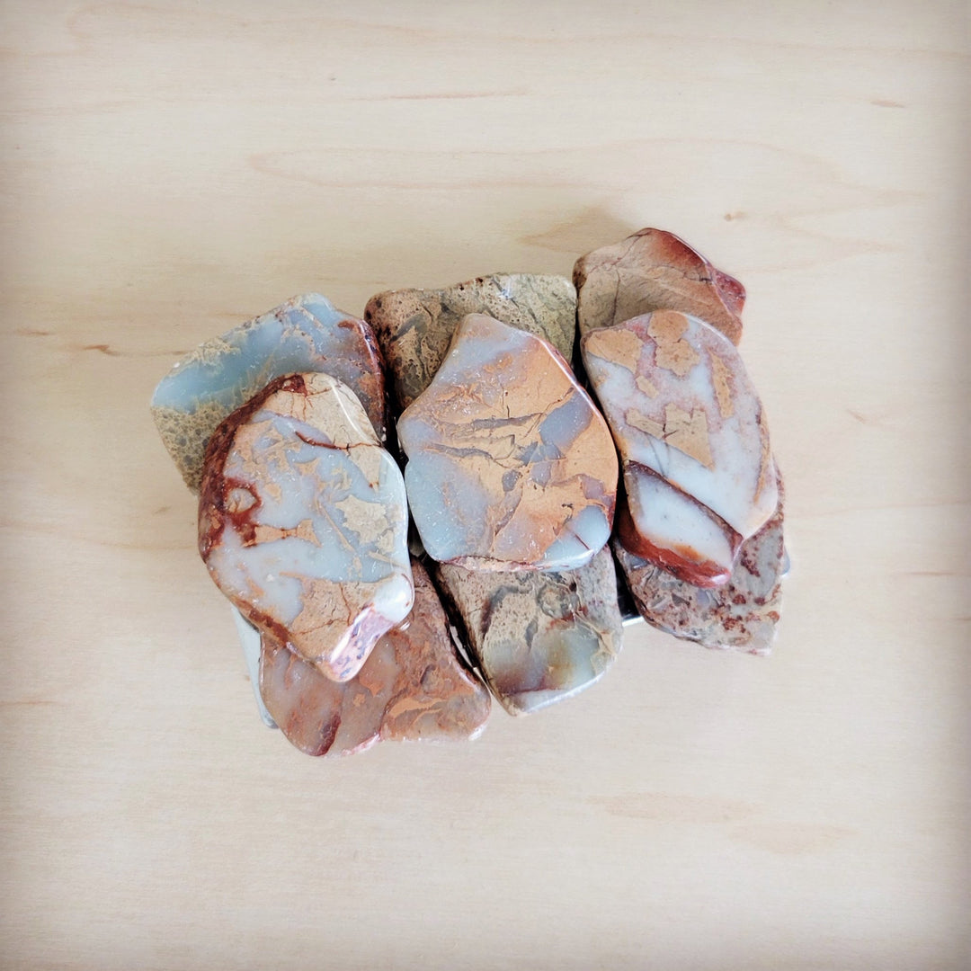 Stone slab belt buckle pieces with aqua, tan, and rust marbled stones