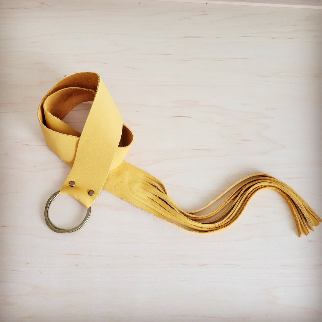 Mustard leather belt with round ring closure and fringe tie ends
