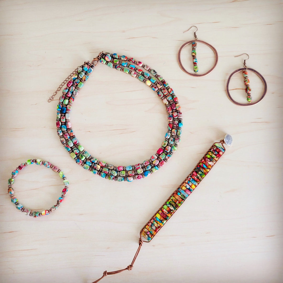 Multi-strand beaded boho necklace with colorful segmented beads and lobster clasp
