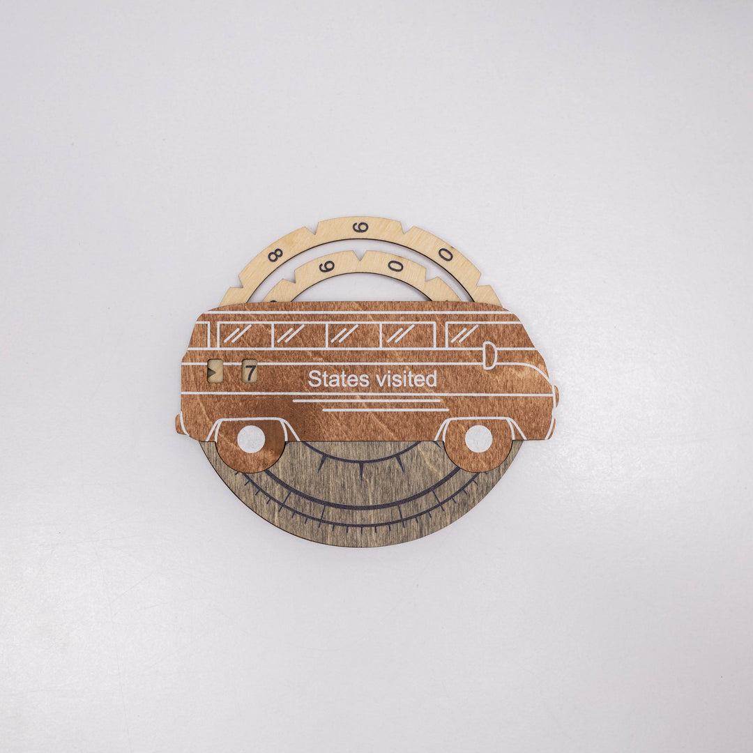 Wooden 3D car-themed wall decor with “States visited” sign and circular base
