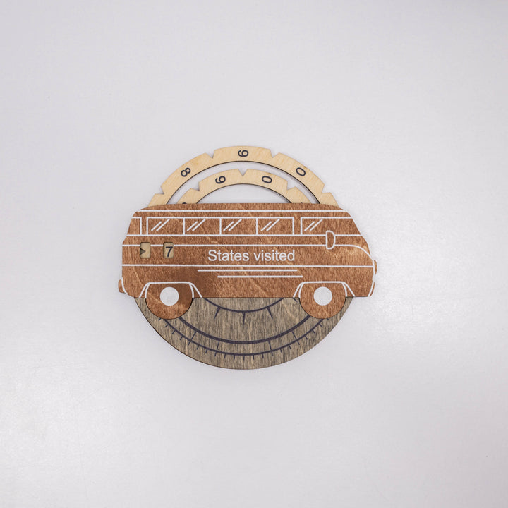 Wooden 3D car-themed wall decor with “States visited” sign and circular base