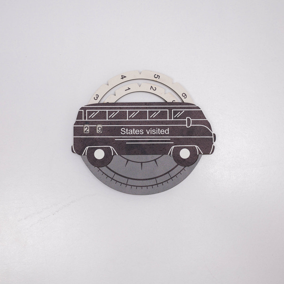 3D wooden USA states-visited travel tracker shaped like a smiling car with dashboard dial
