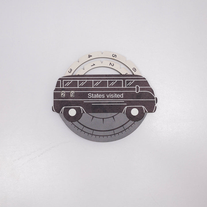 3D wooden USA states-visited travel tracker shaped like a smiling car with dashboard dial
