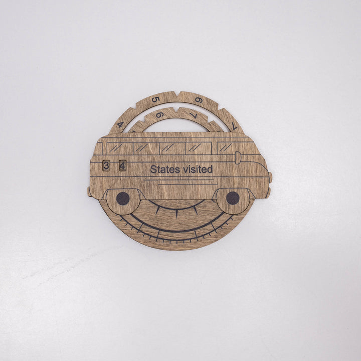 Round wooden states-visited tracker plaque with arched top and States visited bar