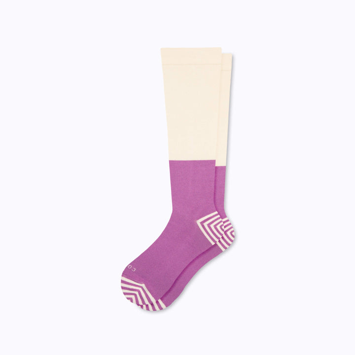 Colorblock compression socks with cream and mulberry panels, striped toe and heel