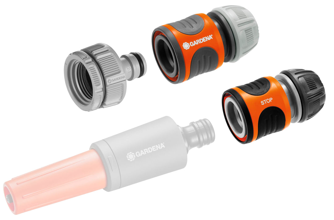 Water stop connector set with orange/black couplers, gray caps, and clear insert