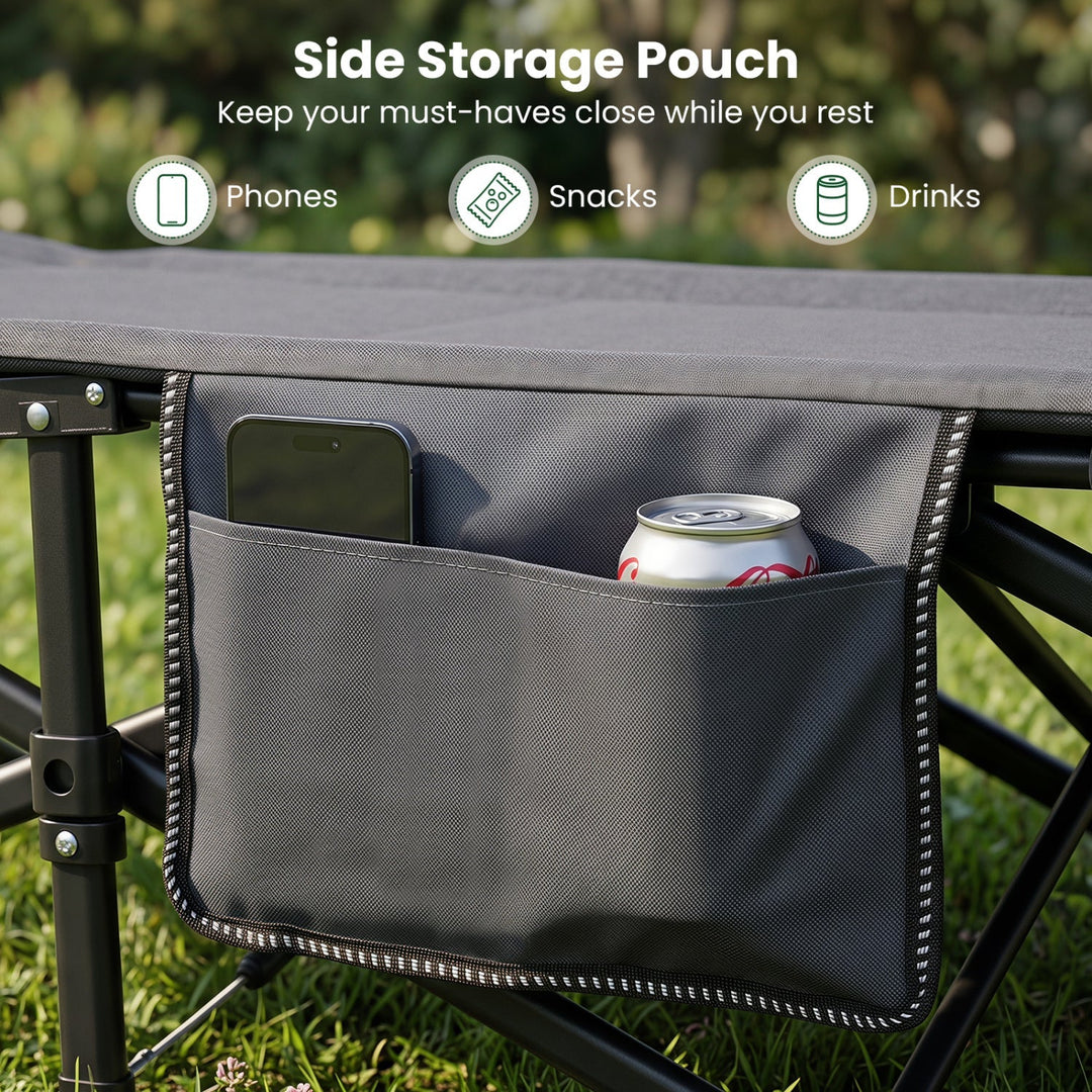 Gray side storage pouch on a folding camping cot, holding drinks and a phone