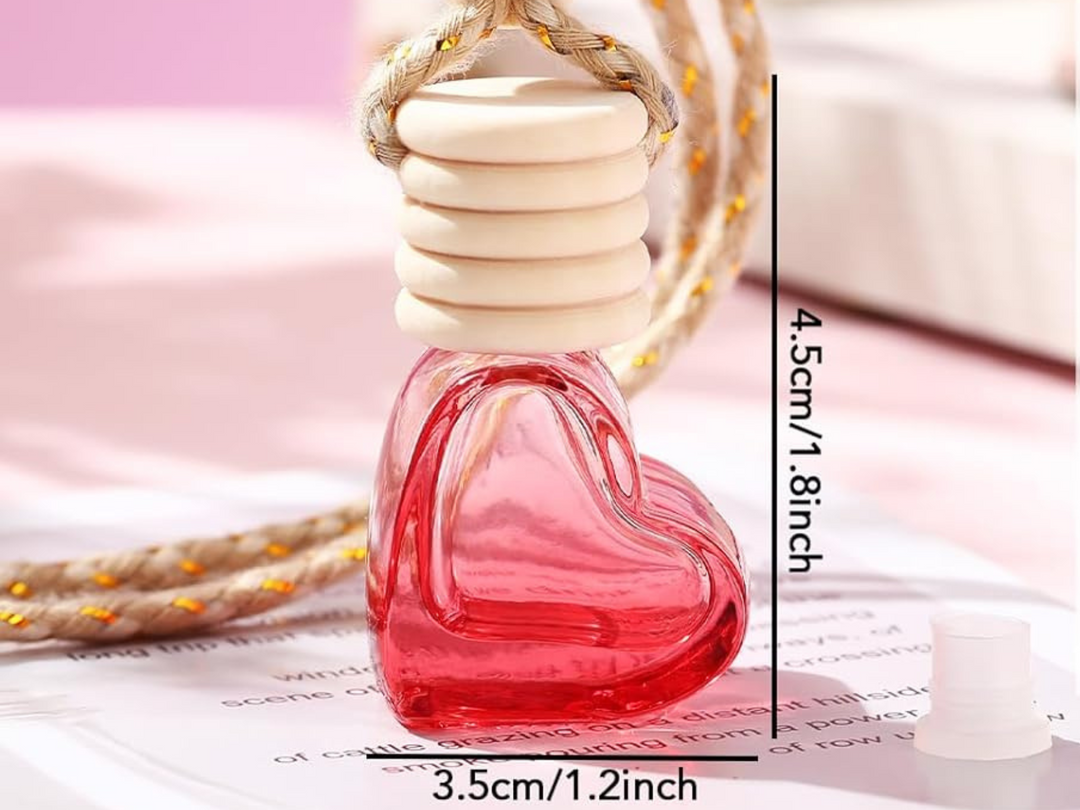 Car freshener bottle with red liquid in clear glass and size measurements