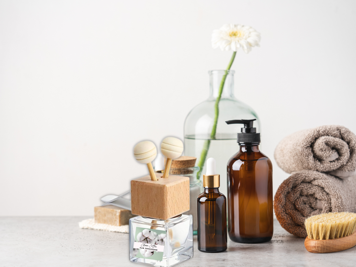 Wooden cube car diffuser holder with square clear glass bottle and white diffuser sticks