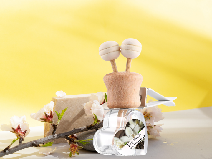 Car vent diffuser glass bottle with wooden holder and flower accents