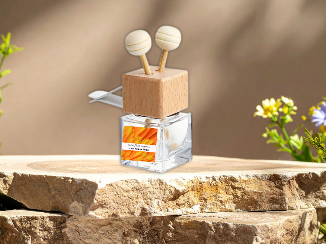 Square car vent diffuser bottle with wooden top and two air freshener sticks