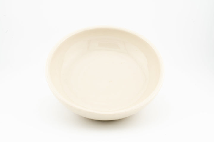 Cream ceramic cat dish with smooth matte glaze
