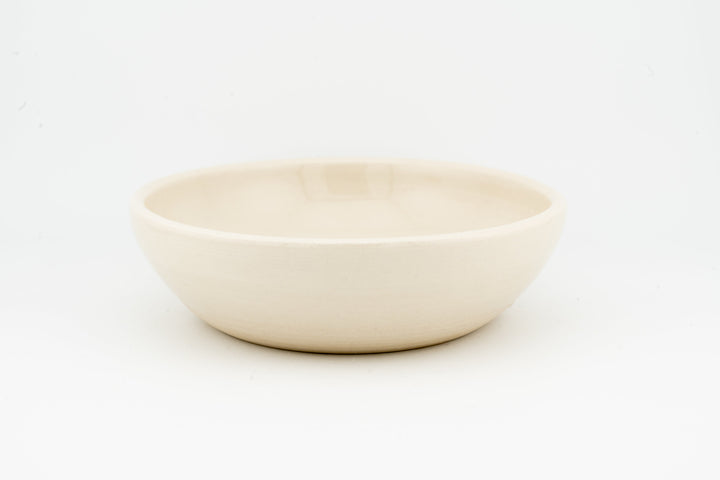 Light beige ceramic cat dish with smooth glaze