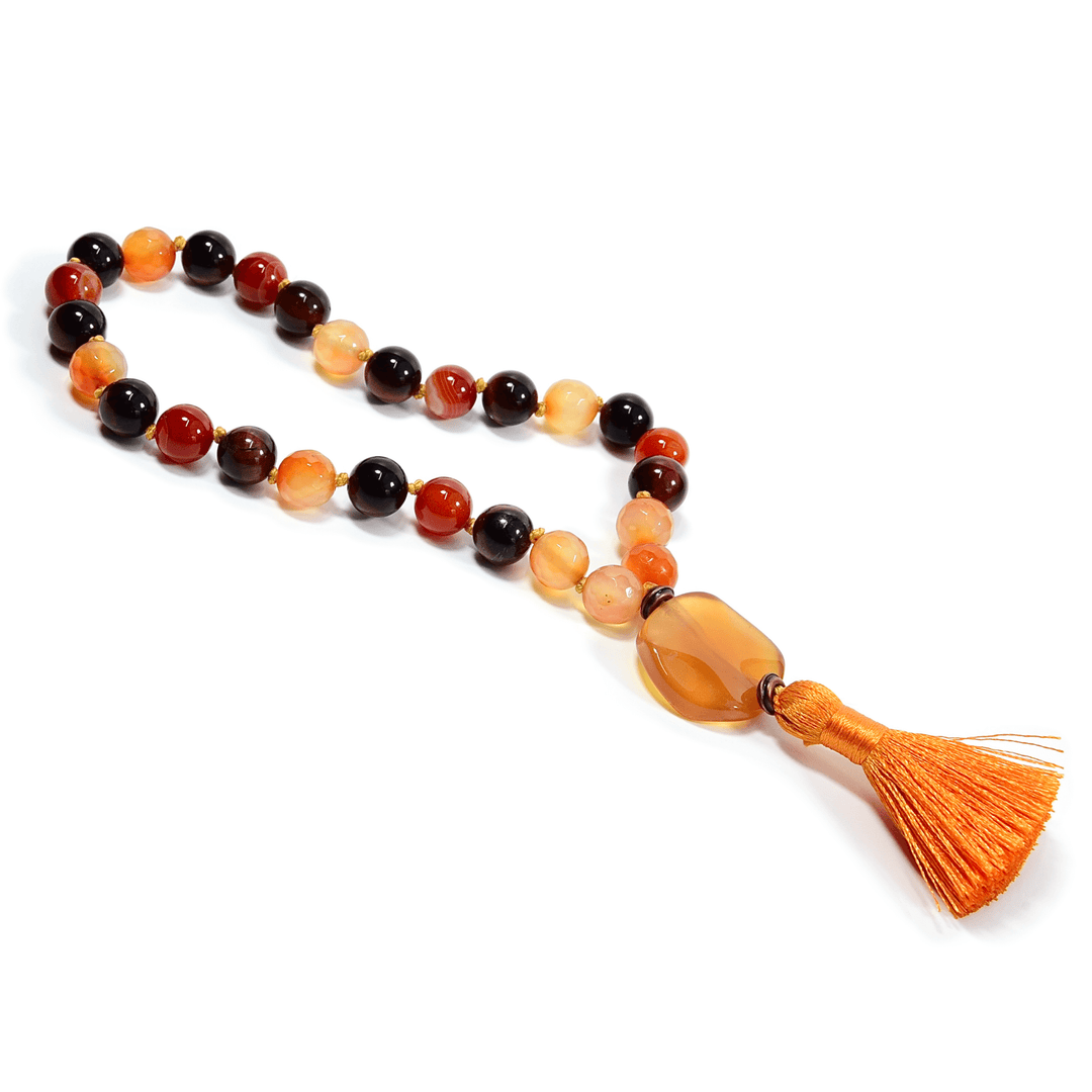 Orange and dark brown bead meditation mala with amber heart pendant and orange tassel