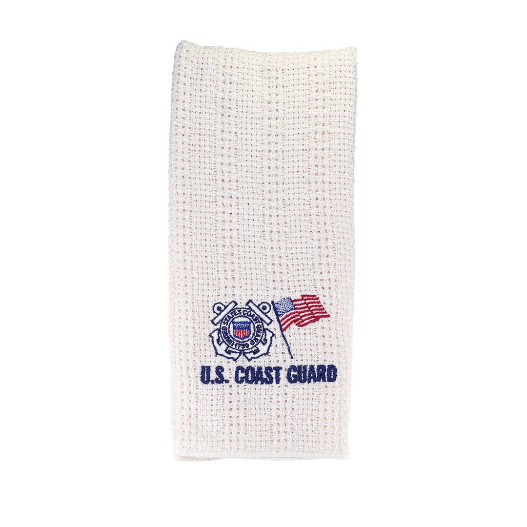 Cream cotton kitchen towel with embroidered U.S. Coast Guard badge and flag