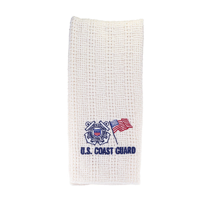 Cream cotton kitchen towel with embroidered U.S. Coast Guard badge and flag