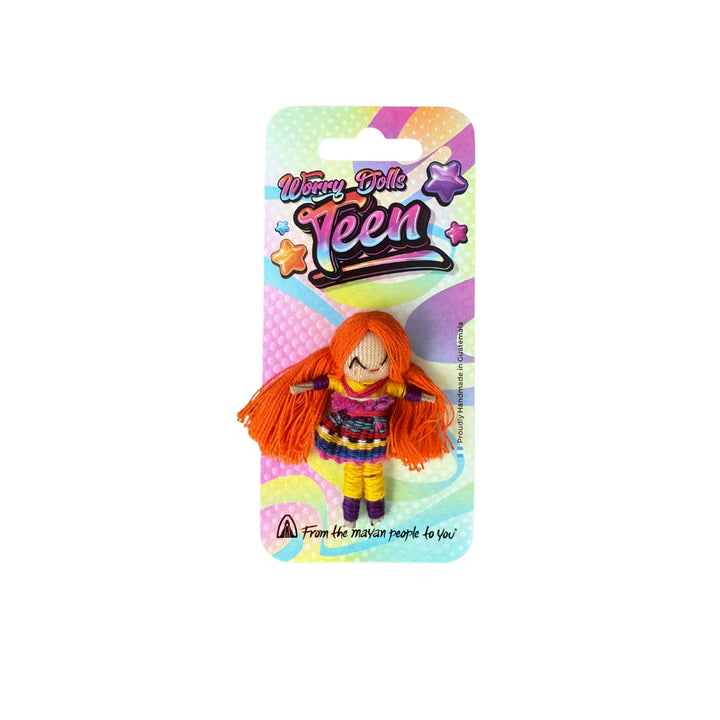 Teen worry doll with orange yarn hair, patterned dress, on blister card with hook