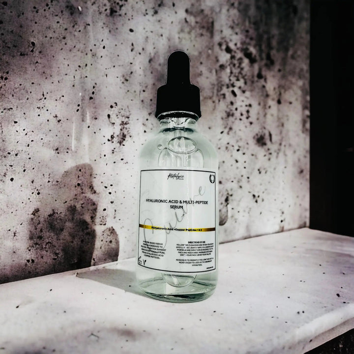Hyaluronic acid facial serum in glass dropper bottle