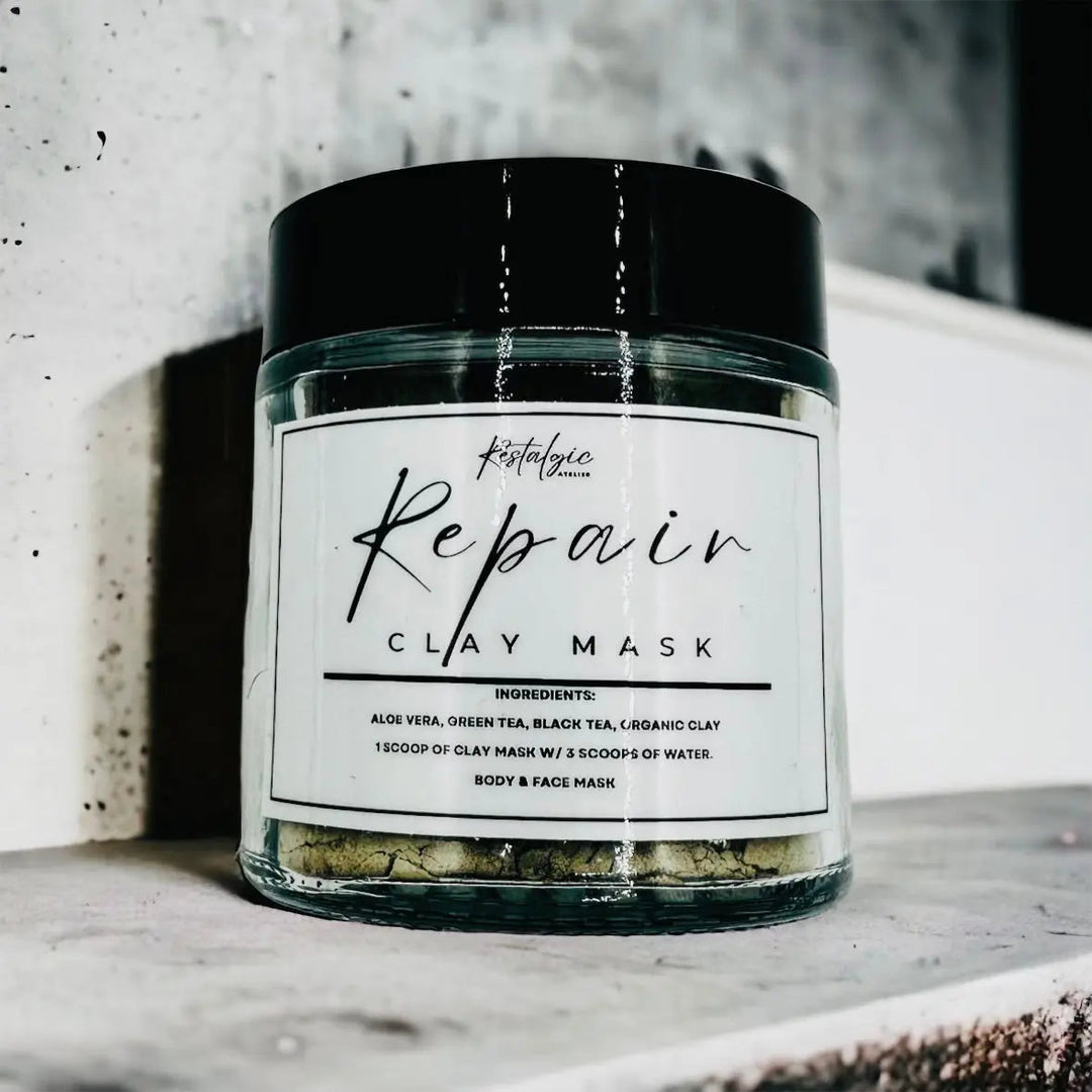 Repair clay mask in clear glass jar with black lid