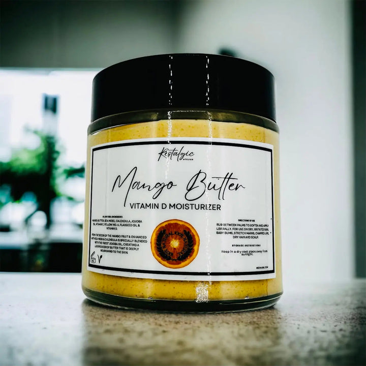 Mango butter vitamin moisturiser in glass jar with black lid