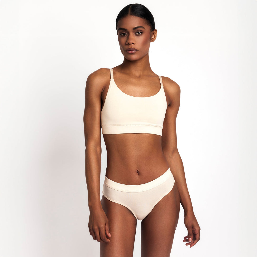 Mid-rise briefs in latte, fitted bikini cut with clean stitching and wide waistband