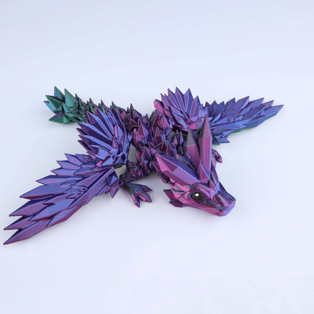 Crystal wing tadling dragon fidget toy, purple and teal iridescent crystal wings