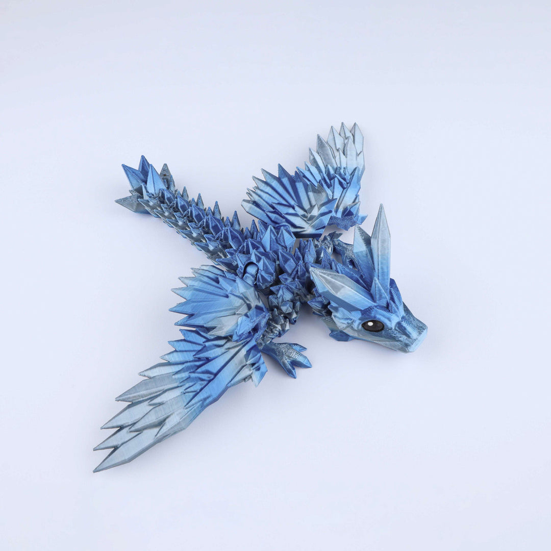 Crystal wing tadling dragon fidget toy, shiny blue crystal wings and dragon head