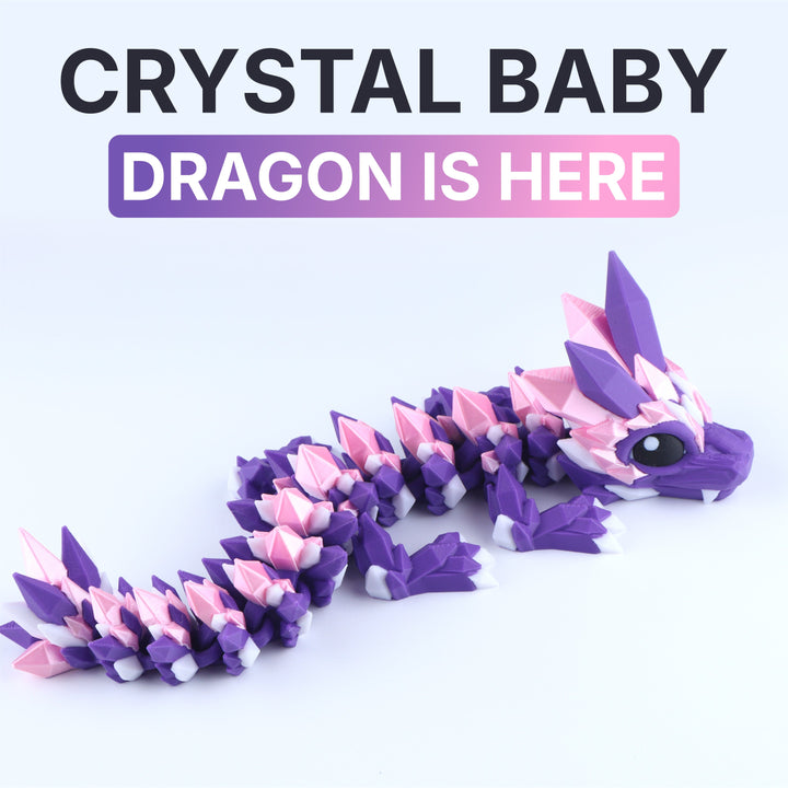 Articulated crystal baby dragon fidget toy in purple with large white eye