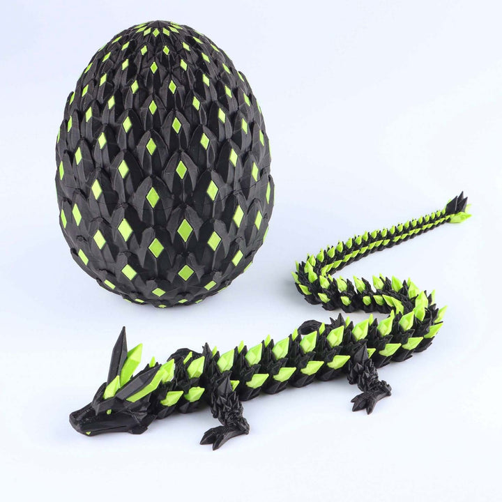 Articulated crystal dragon fidget toy with shiny black and neon green egg