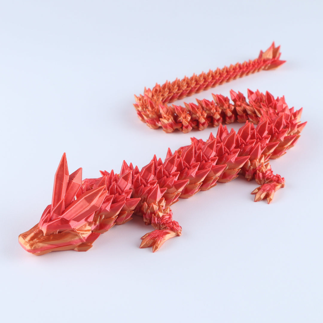 Articulated crystal dragon fidget toy with red faceted dragon body