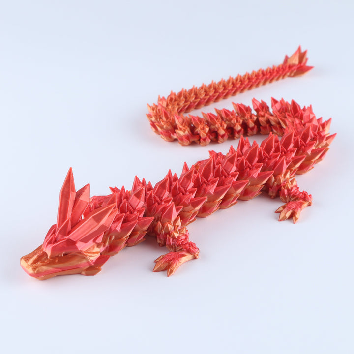 Articulated crystal dragon fidget toy with red faceted dragon body