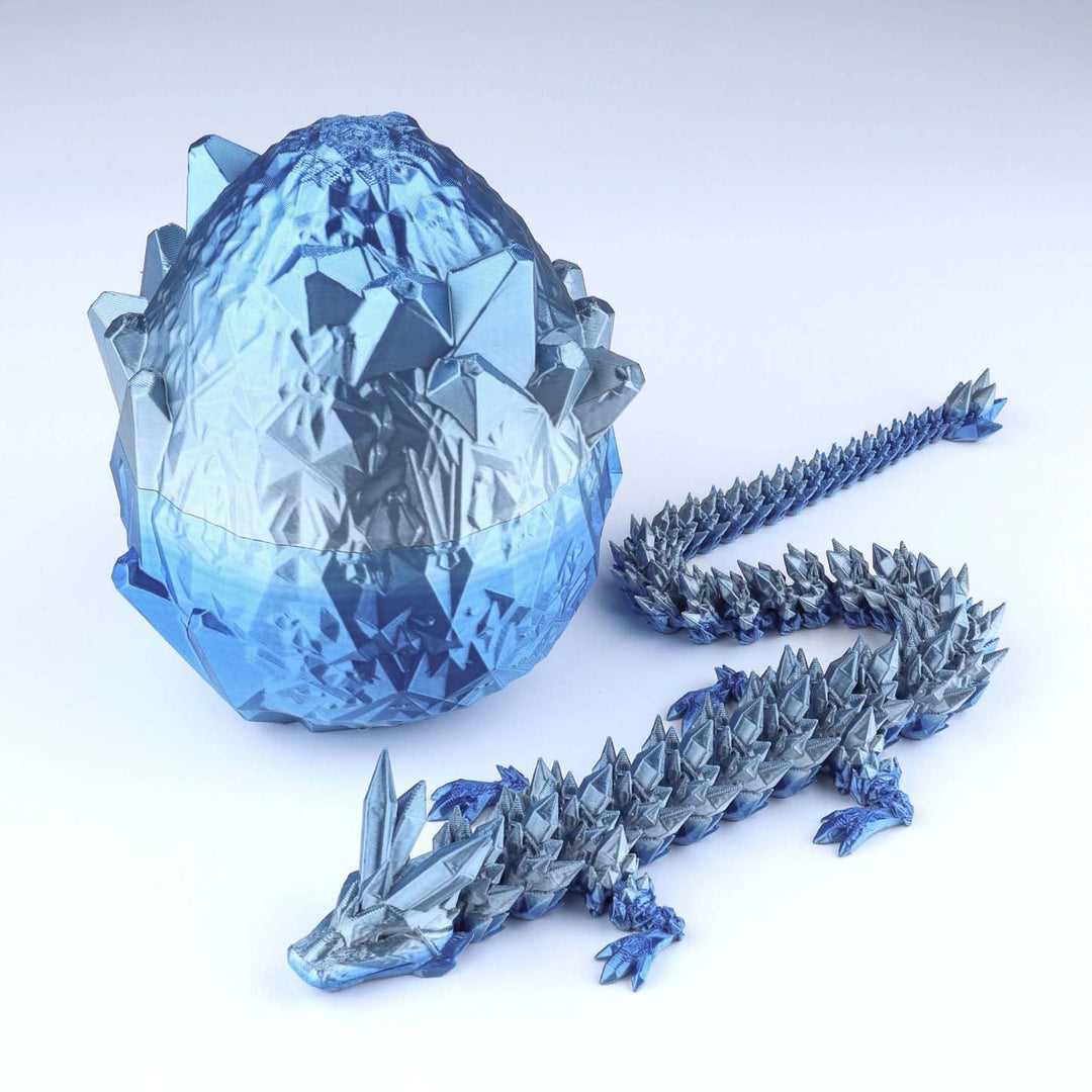 Shiny blue crystal dragon fidget toy with faceted egg shell and articulated dragon pieces