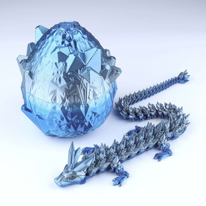 Shiny blue crystal dragon fidget toy with faceted egg shell and articulated dragon pieces