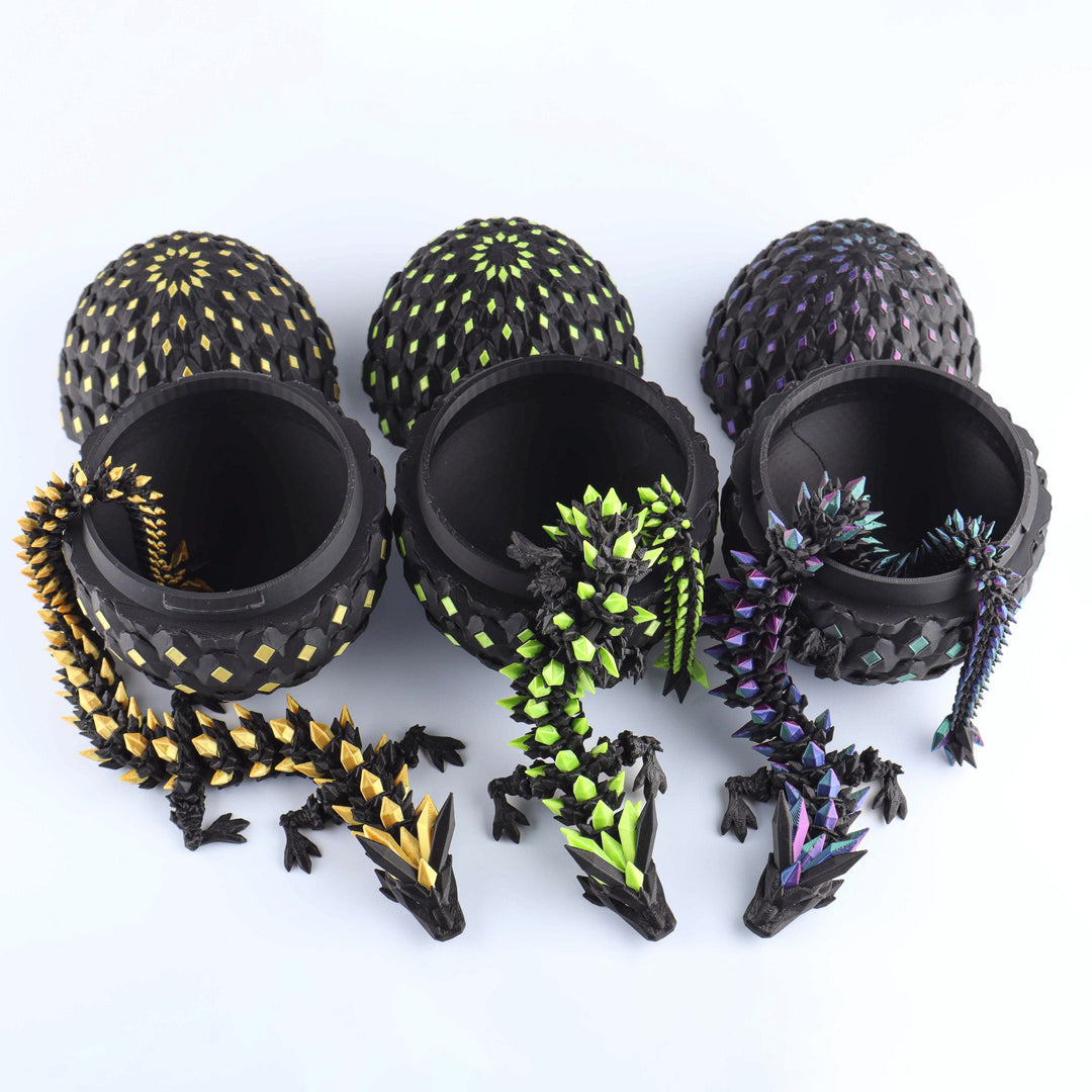 Dark crystal dragon fidget toy set with black shell and green, purple articulated pieces